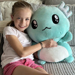Hey, are any fellow axolotl enthusiasts present? You've got to take a look at this adorable axolotl plushie! It's got the most adorable big eyes and ears that sparkle. Made with a plushy fabric and filled with super soft PP cotton, you won't be able to resist cuddling it. This plush toy isn't just cute, it also doubles as a cozy throw pillow.