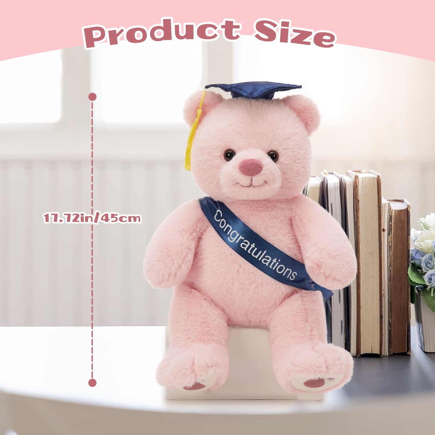 Graduation stuffed bear sitting on books with 2025 congratulations ribbon