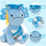 Cute animal plush toy axolotl dressed in graduation outfit with mortarboard hat and diploma, ideal graduation present for students finishing college or high school.