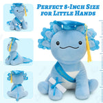 Kawaii-style axolotl stuffed plush wearing a graduation cap and colorful sash, holding a scroll certificate, designed as a soft and cute graduation keepsake gift.