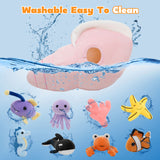 A pink plush Conch with seven ocean-themed stuffed animals: Jellyfish, Whale, Hermit Crab, Starfish, Seahorse, Coral, Glow Fish, and Clownfish.