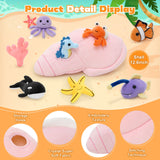 A pink plush Conch with seven ocean-themed stuffed animals: Jellyfish, Whale, Hermit Crab, Starfish, Seahorse, Coral, Glow Fish, and Clownfish.