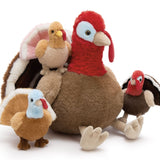 Turkey Squad plush set with one large turkey and three small baby turkey stuffed toys, soft and cuddly, perfect for Thanksgiving or gift giving.