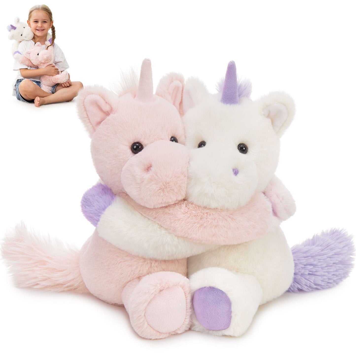 Two plush unicorns, one pink and one white with a purple horn, on a white background.